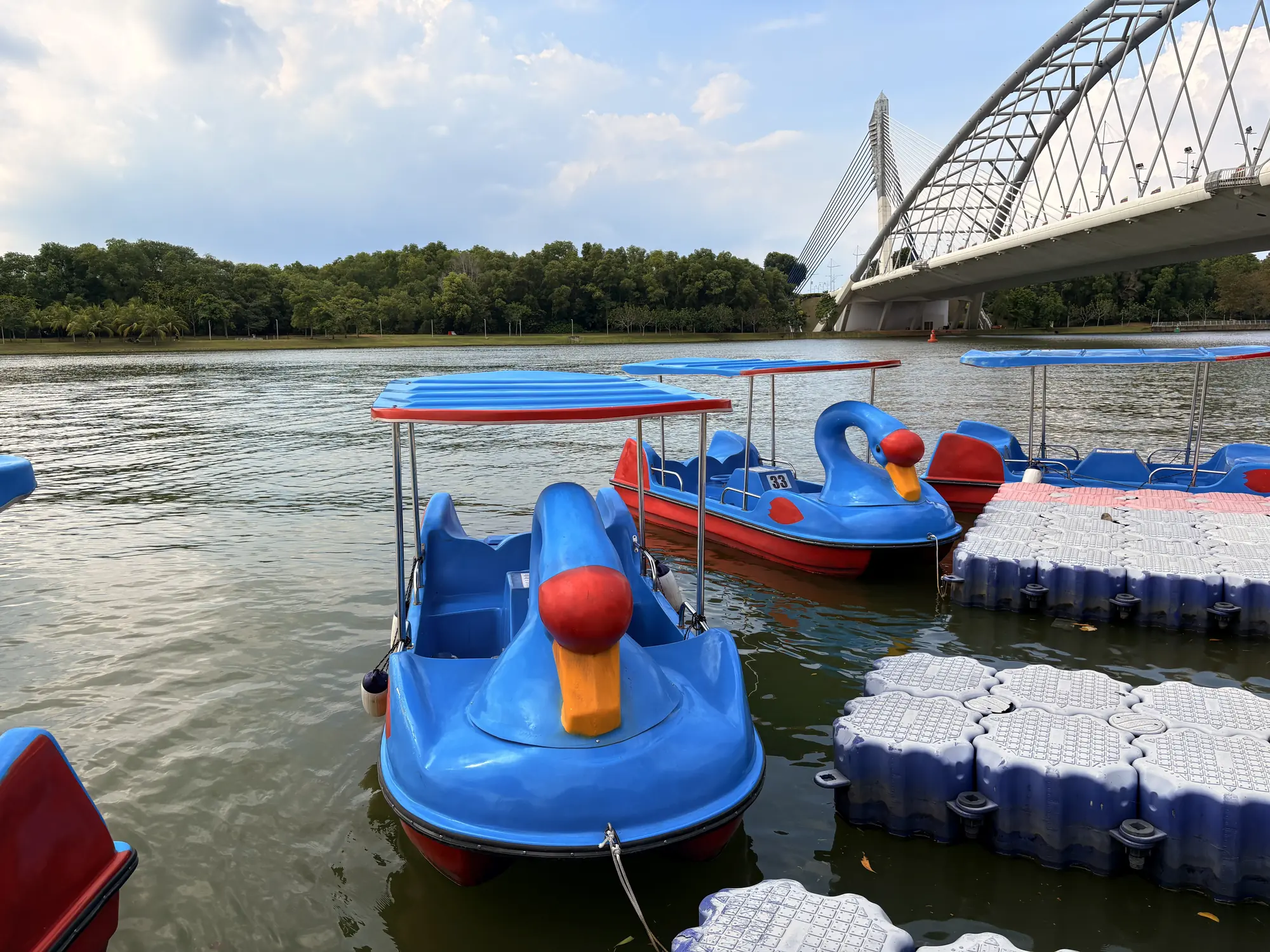 Pusat Rekreasi Air Floria Putrajaya: Kayak under the bridges, with the skyline on the water.