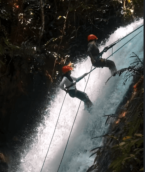 Abseiling down a waterfall, Gopeng Glamping Park